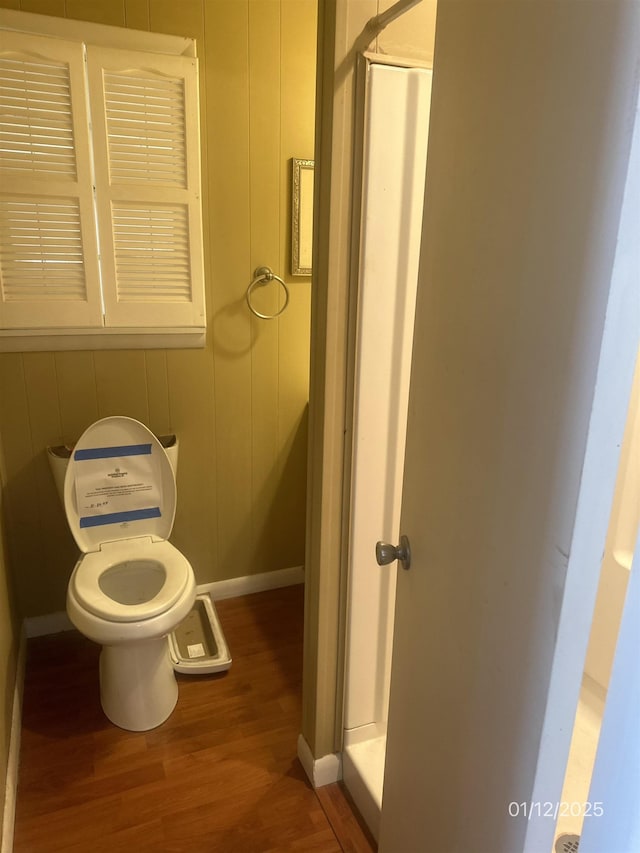 1013 Elm St, Coal Hill, AR 72832 - bathroom with wood-type flooring and toilet