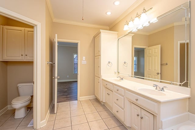 4636 Brandywine Cv, Sherwood, AR 72120 - full bathroom with double vanity, tile patterned floors, ornamental molding, toilet, and baseboards