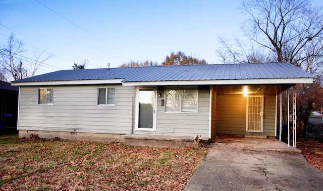 view of front of house with a carport