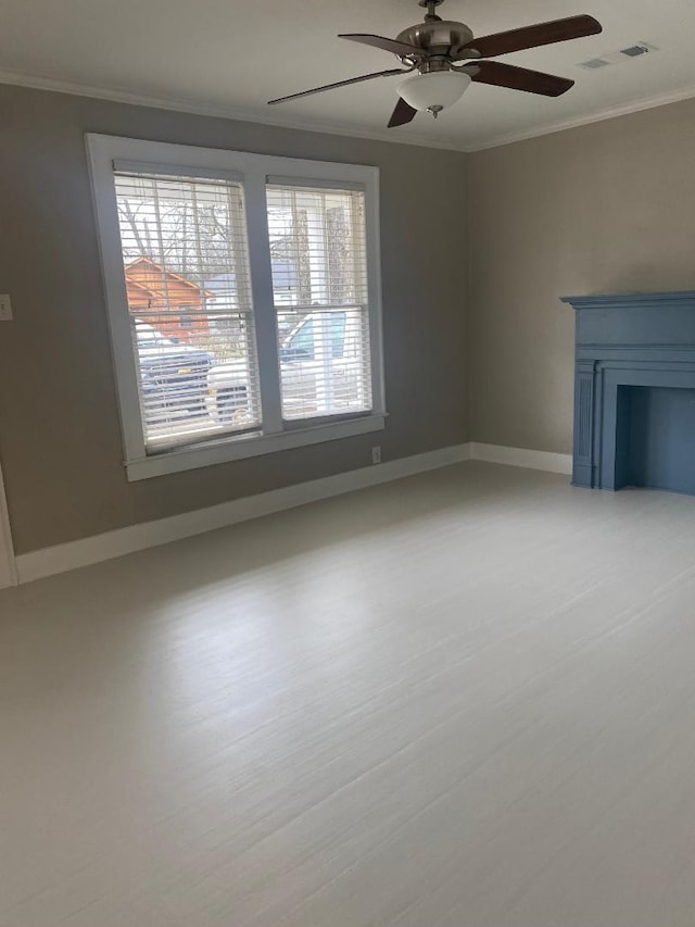 unfurnished living room with ceiling fan, ornamental molding, and light wood-type flooring