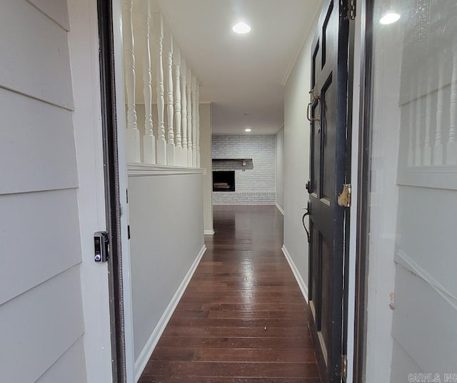 hall with dark wood-type flooring