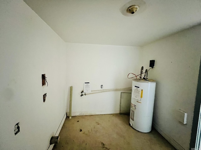 washroom featuring light carpet and water heater