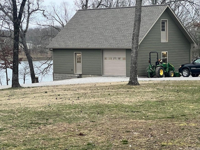 garage with a yard