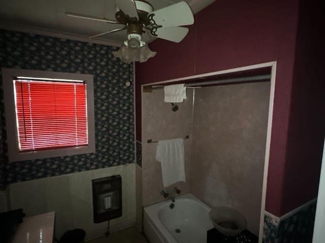 bathroom featuring tub / shower combination and ceiling fan