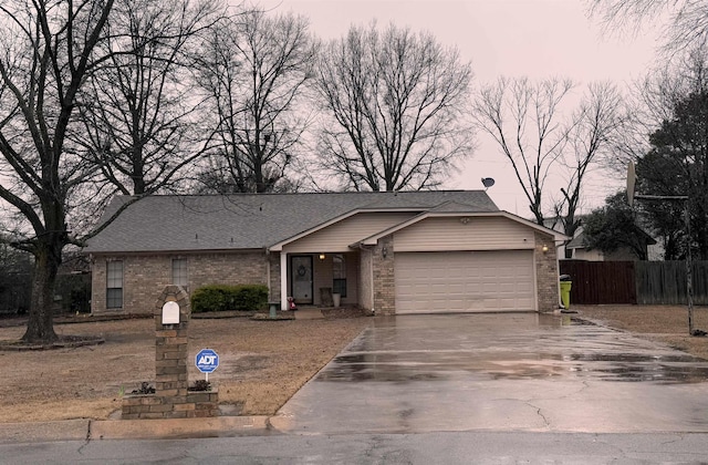 ranch-style home with a garage