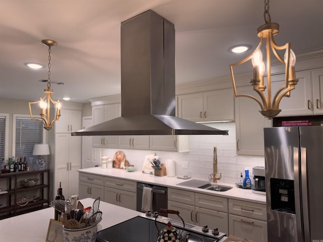 kitchen with sink, tasteful backsplash, decorative light fixtures, island exhaust hood, and stainless steel appliances