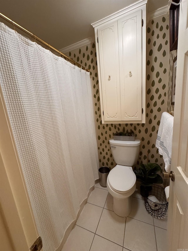 bathroom with ornamental molding, a shower with shower curtain, tile patterned floors, and toilet