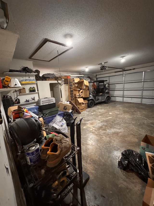 garage featuring a garage door opener