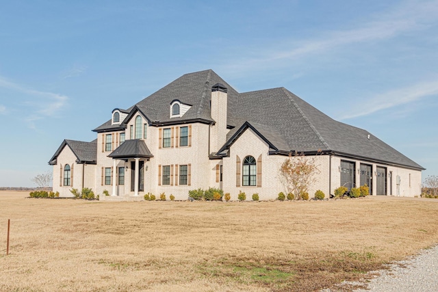 view of front of house with a front lawn