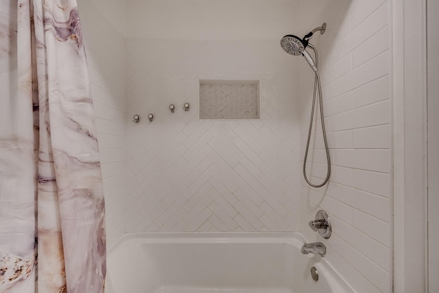 bathroom featuring shower / bath combo with shower curtain