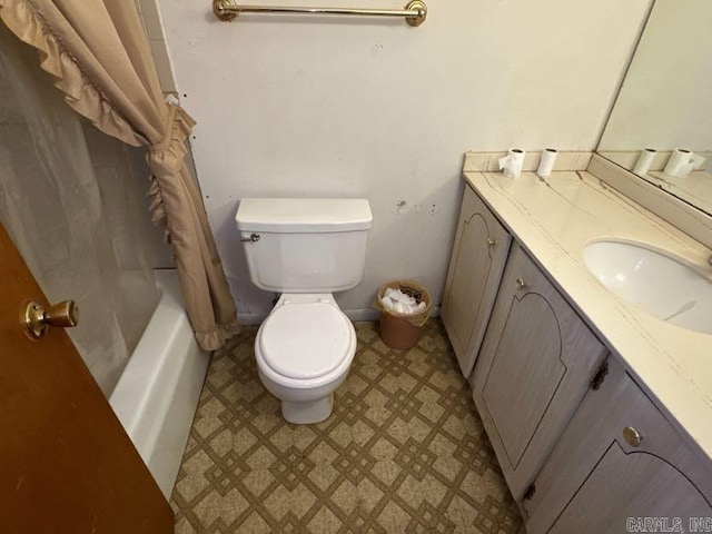 full bathroom featuring vanity, shower / tub combo, and toilet