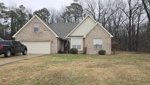 front facade featuring a garage and a front yard