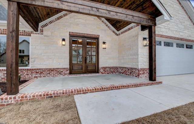 entrance to property featuring french doors