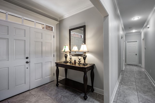 entrance foyer featuring crown molding