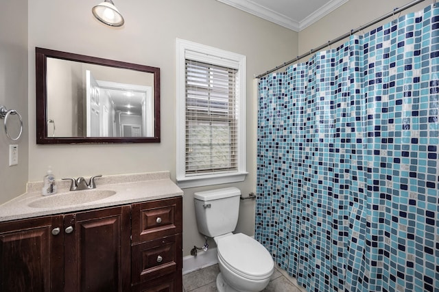 bathroom featuring vanity, tile patterned floors, ornamental molding, and toilet