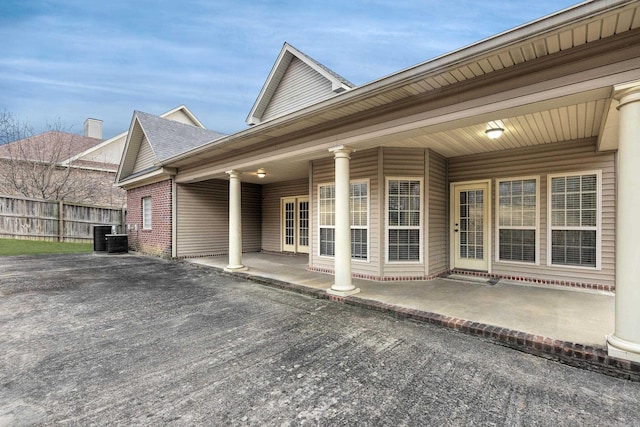 exterior space with a patio and central air condition unit