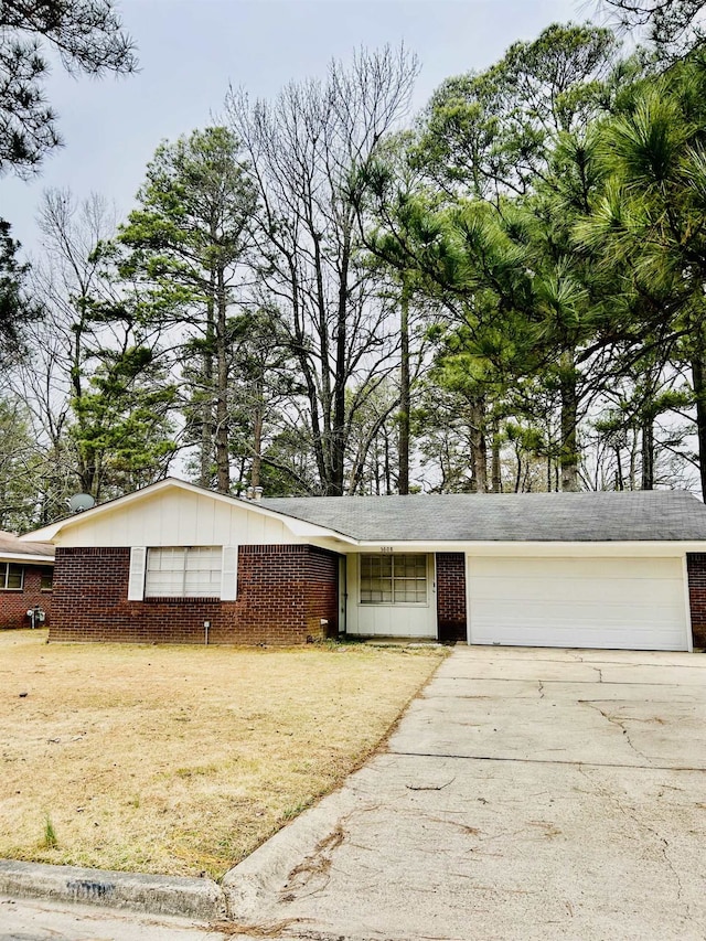 single story home with a garage