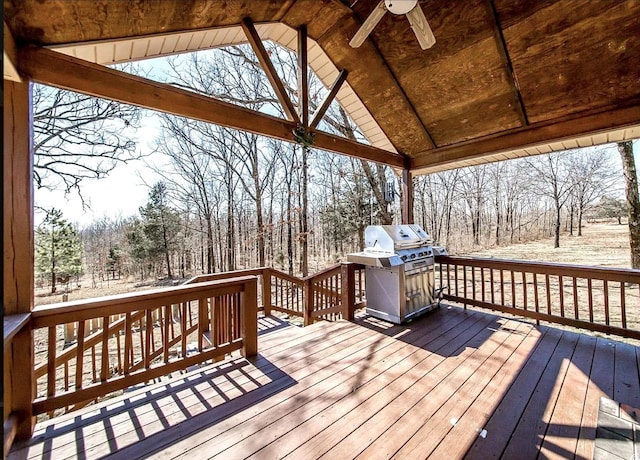 wooden deck featuring ceiling fan and grilling area