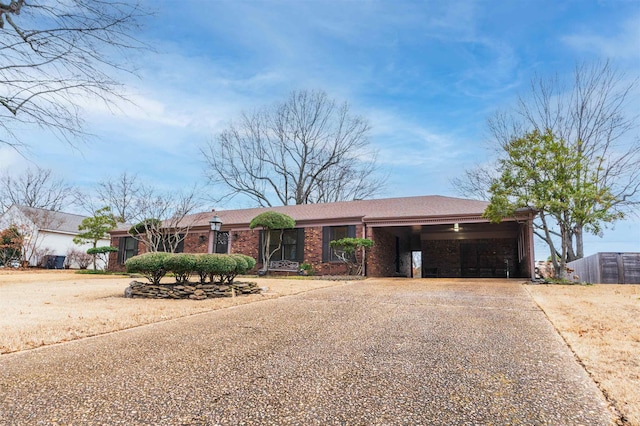 ranch-style house featuring a garage