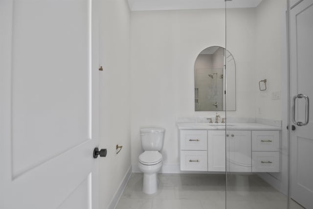 full bath featuring baseboards, toilet, marble finish floor, walk in shower, and vanity