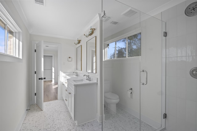 full bath with ornamental molding, a stall shower, a sink, and double vanity