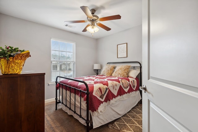 carpeted bedroom with ceiling fan