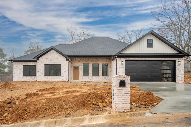 view of front of property with a garage