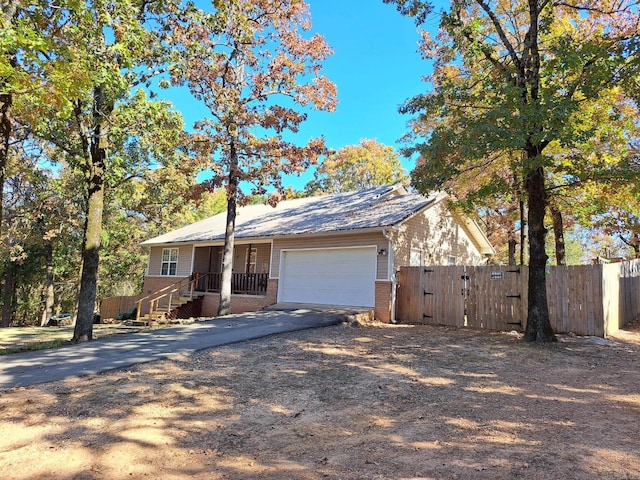 single story home featuring a garage