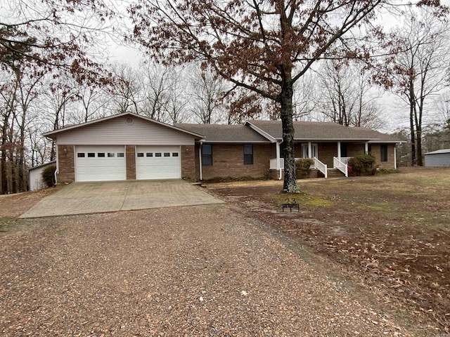 ranch-style house featuring a garage