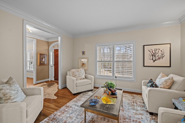 living room featuring ornamental molding and hardwood / wood-style floors