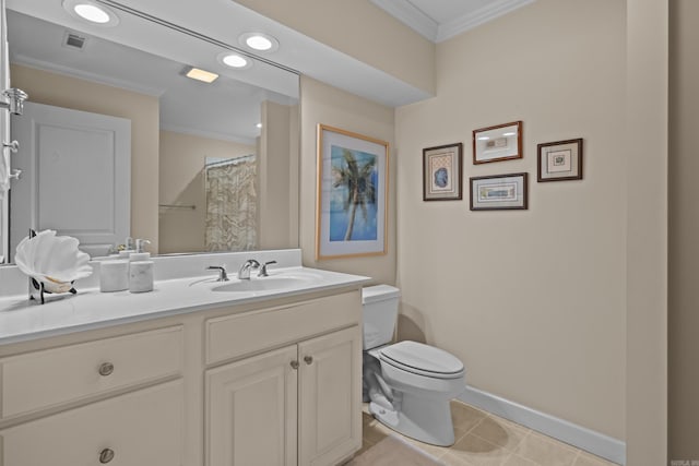 bathroom featuring crown molding, tile patterned floors, vanity, and toilet