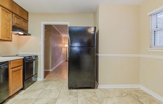 kitchen featuring black appliances