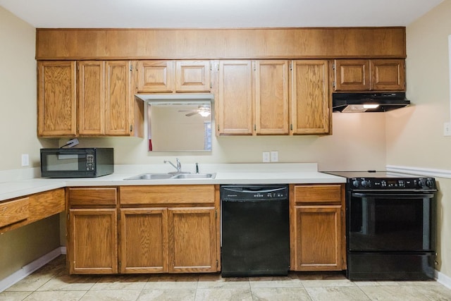 kitchen featuring sink and black appliances