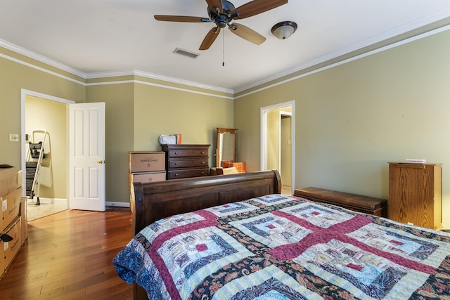 bedroom featuring crown molding, dark hardwood / wood-style floors, and ceiling fan