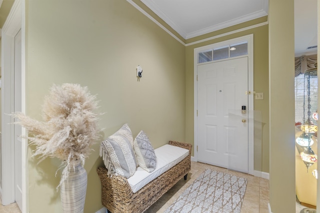 tiled entrance foyer featuring ornamental molding