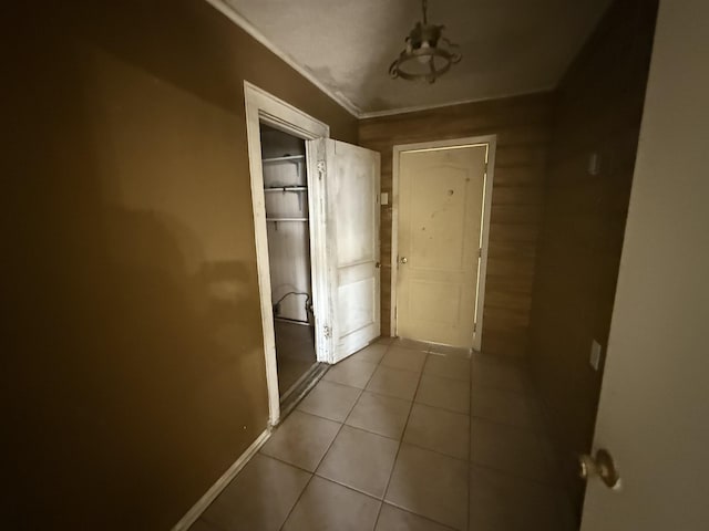 corridor featuring light tile patterned flooring