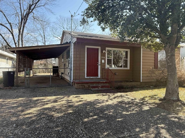 view of front of home with a carport