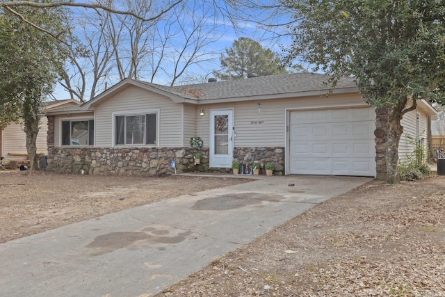 single story home featuring a garage