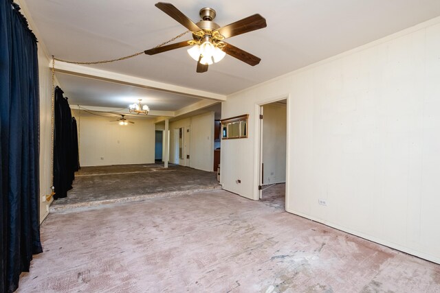 carpeted empty room featuring crown molding and ceiling fan