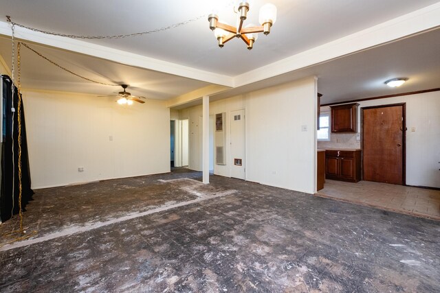 unfurnished living room with an inviting chandelier and beam ceiling