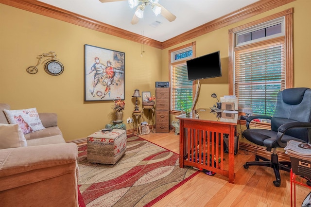 office space featuring hardwood / wood-style flooring, ceiling fan, and ornamental molding