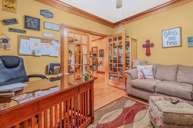 office area featuring crown molding, ceiling fan, hardwood / wood-style floors, and french doors