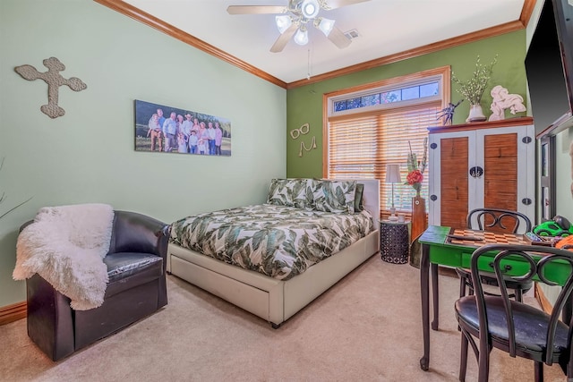 carpeted bedroom featuring ceiling fan and ornamental molding