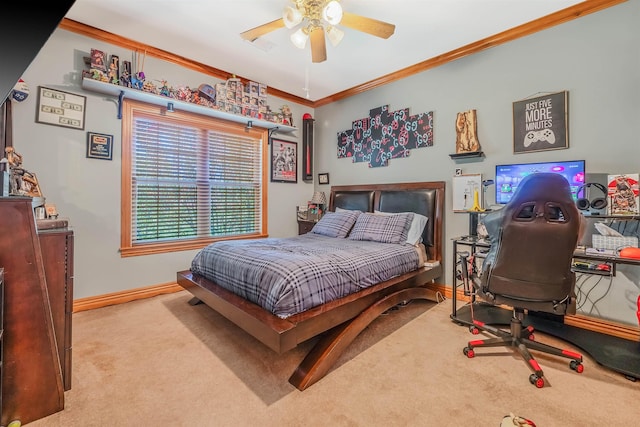 bedroom with ornamental molding, light colored carpet, and ceiling fan