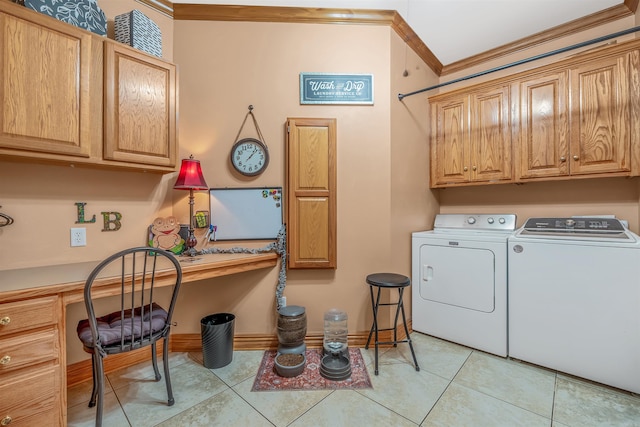 laundry area featuring cabinets, crown molding, separate washer and dryer, and light tile patterned floors