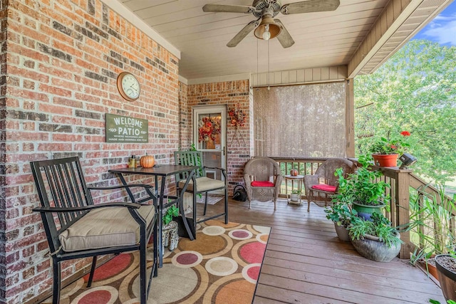 wooden terrace with ceiling fan