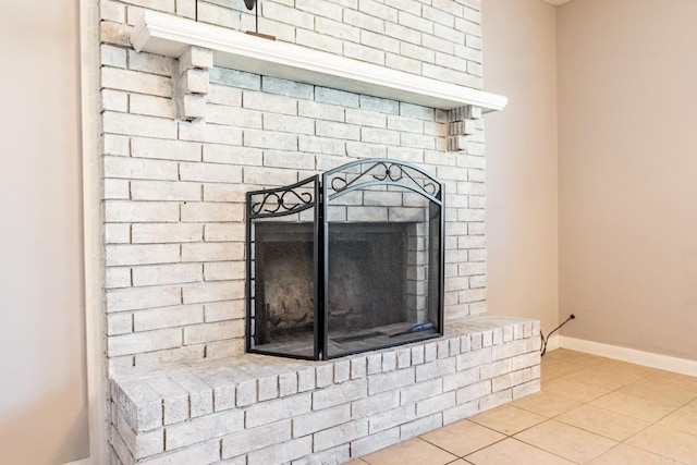 room details featuring a brick fireplace