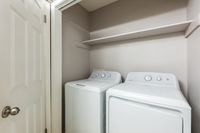 laundry room featuring independent washer and dryer