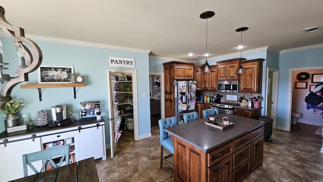 kitchen with appliances with stainless steel finishes, a breakfast bar area, decorative backsplash, hanging light fixtures, and a center island