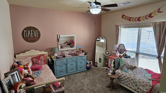 bedroom featuring ceiling fan and carpet flooring